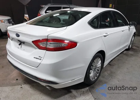 2013 Ford Fusion Hybrid Se z USA, uszkodzony, nr VIN 3FA6P0LUXDR328767